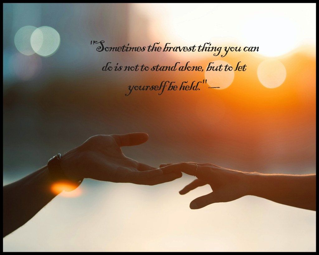 Two hands reaching toward each other in soft light — symbol of allowing oneself to be held.